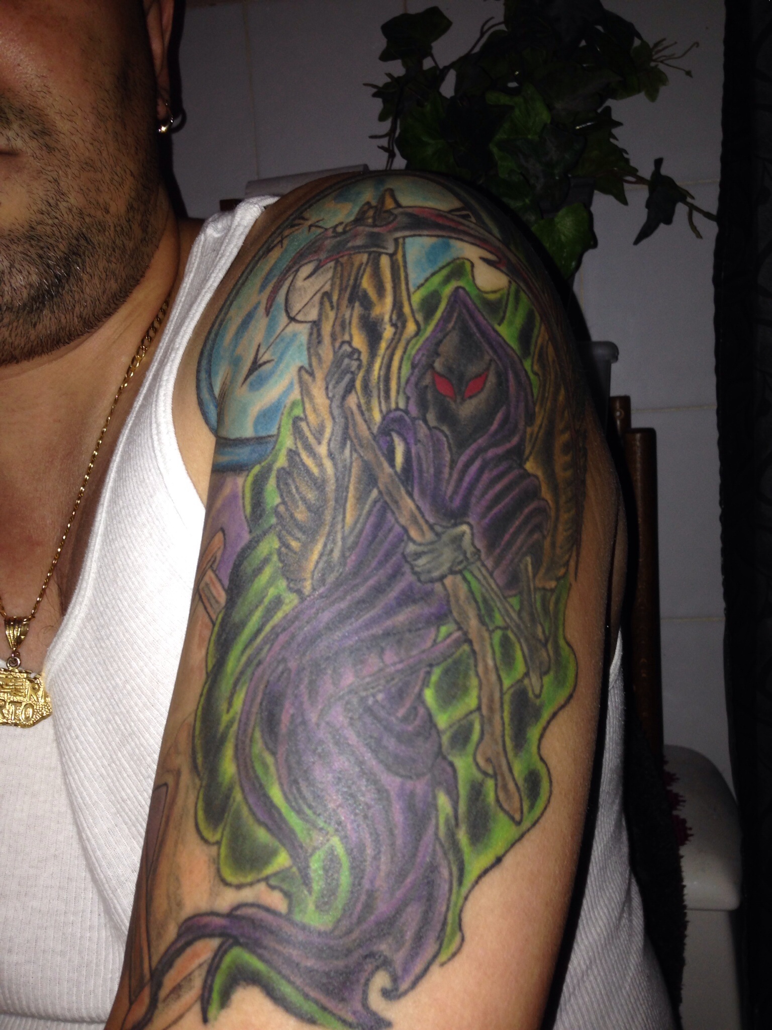 Colored Death Grim Reaper Tattoo On Left Half Sleeve