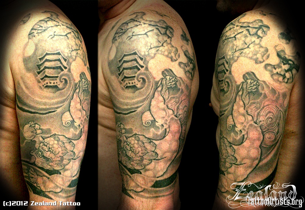 Fine Grey Ink Asian Tattoo On Left Half Sleeve