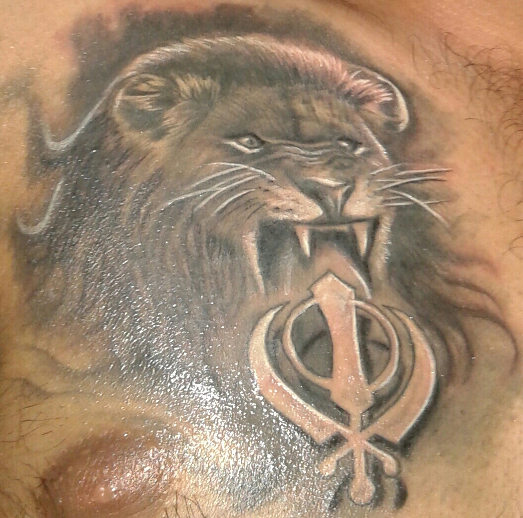 Grey Ink Lion With Khanda Tattoo