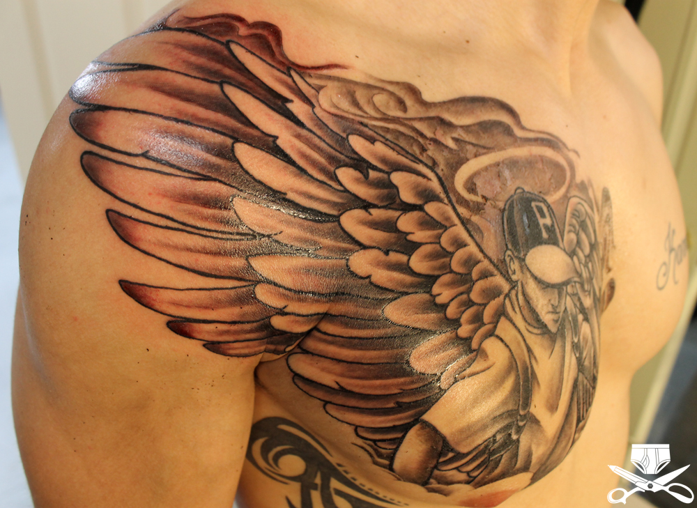 Wonderful Grey Ink Angel Chest Tattoo