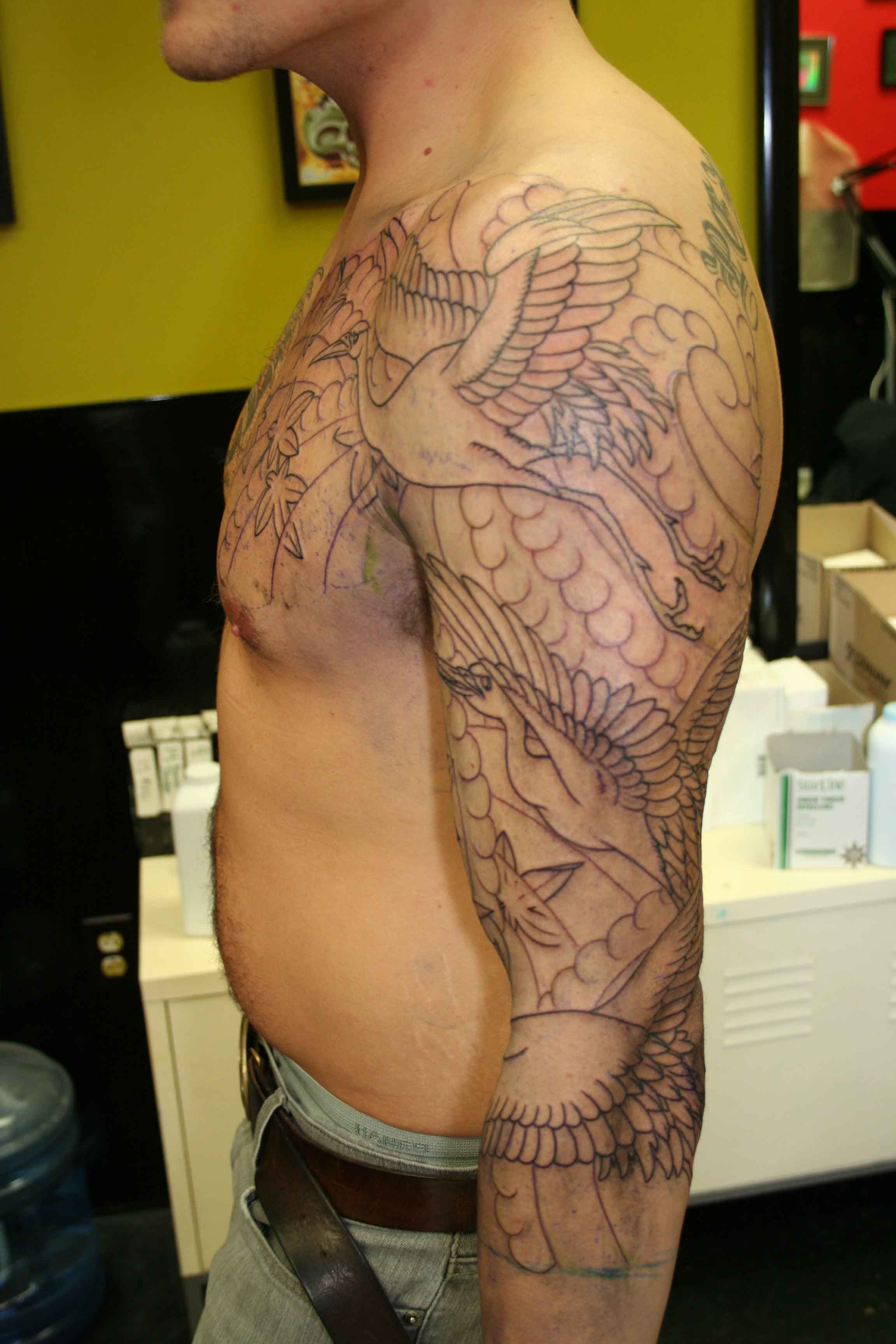 Awesome Crane Tattoo On Man Left Sleeve