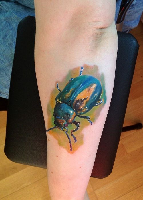 Realistic Color Beetle Tattoo On Arm