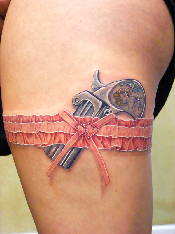 Small Gun Garter And Lace Tattoo