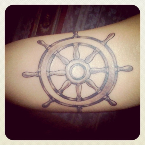 Grey Ink Sailor Compass Tattoo On Inner Bicep