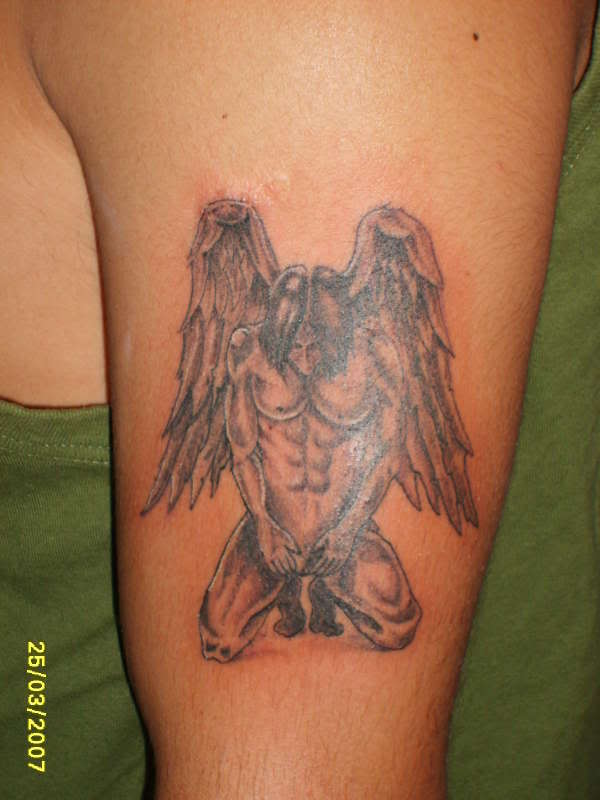 Fallen Angel Tattoo On Left Bicep