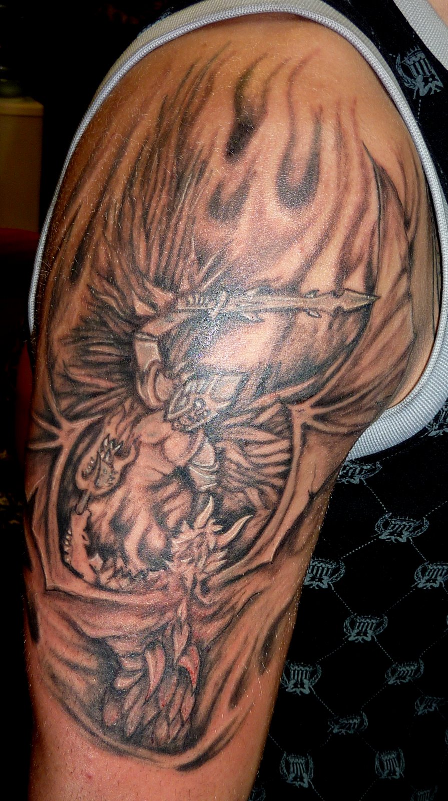 Flaming Fallen Angel Tattoo On Half Sleeve