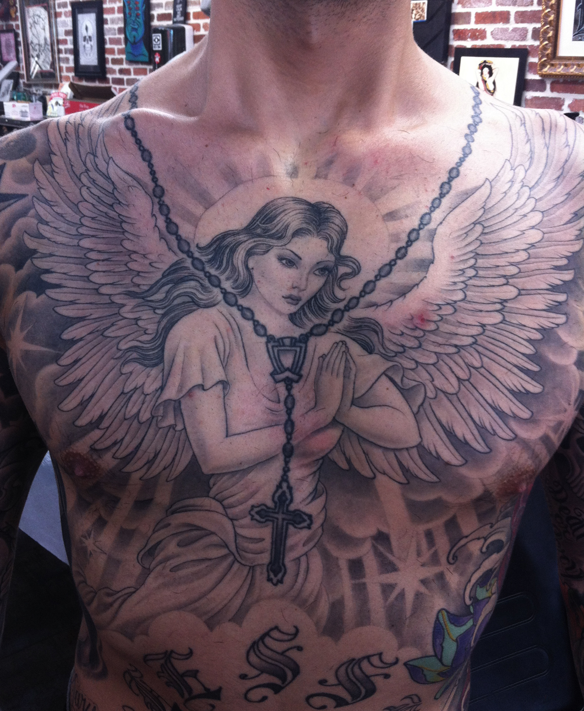 Praying Angel Tattoo On Man Chest
