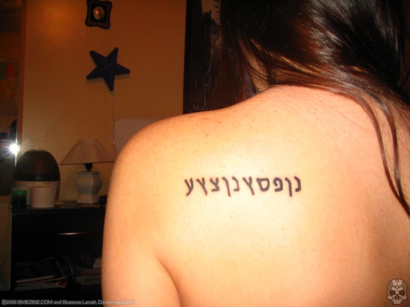 Left Back Shoulder Hebrew Tattoo For Girls