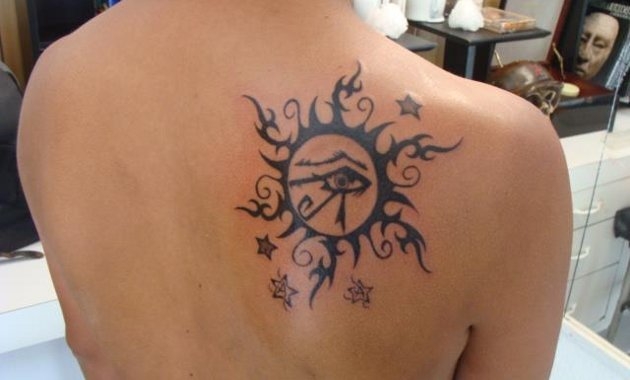 Tribal Sun and Horus Eye Tattoo On Right BAck Shoulder