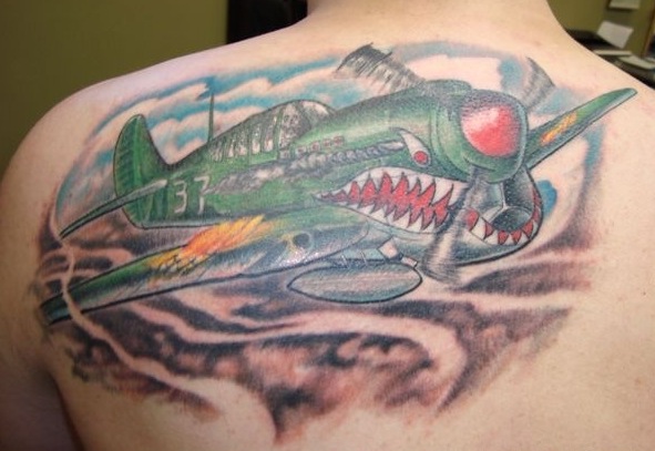 Green Ink Airplane Tattoo On Back