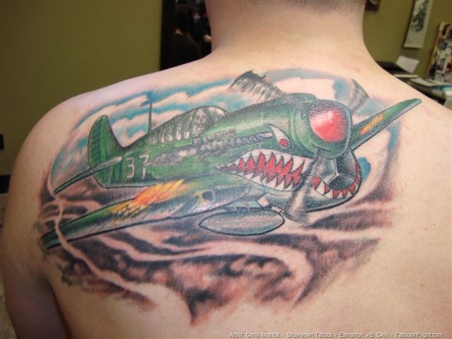 Shark Airplane Tattoo On Man Upperback