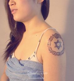 Star and Ouroboros Tattoo On Girl Left Shoulder