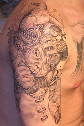 Grey Ink Goblin Tattoo On Man Right Half Sleeve