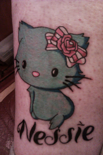 Nessie Kitty Tattoo On Sleeve