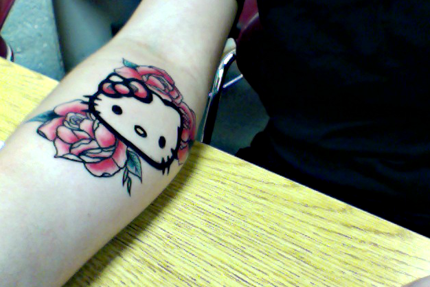 Red Rose And Kitty Tattoo On Right Arm
