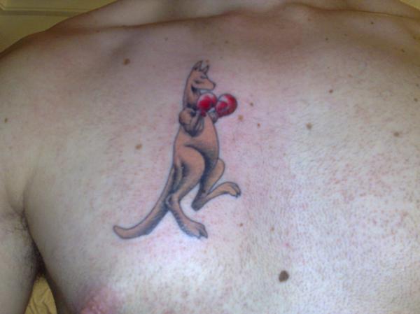 Kangaroo With Boxing Gloves Tattoo On Man Chest