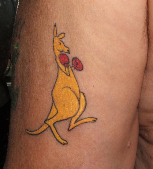 Yellow Kangaroo Tattoo On Side