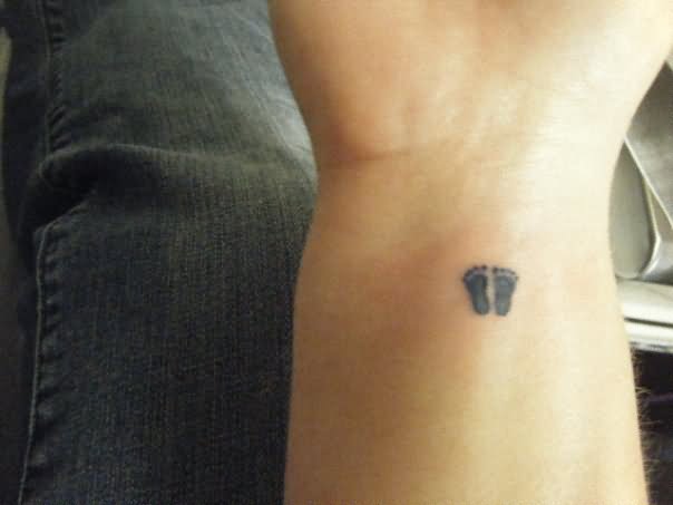 Small Footprints Tattoo On Wrist