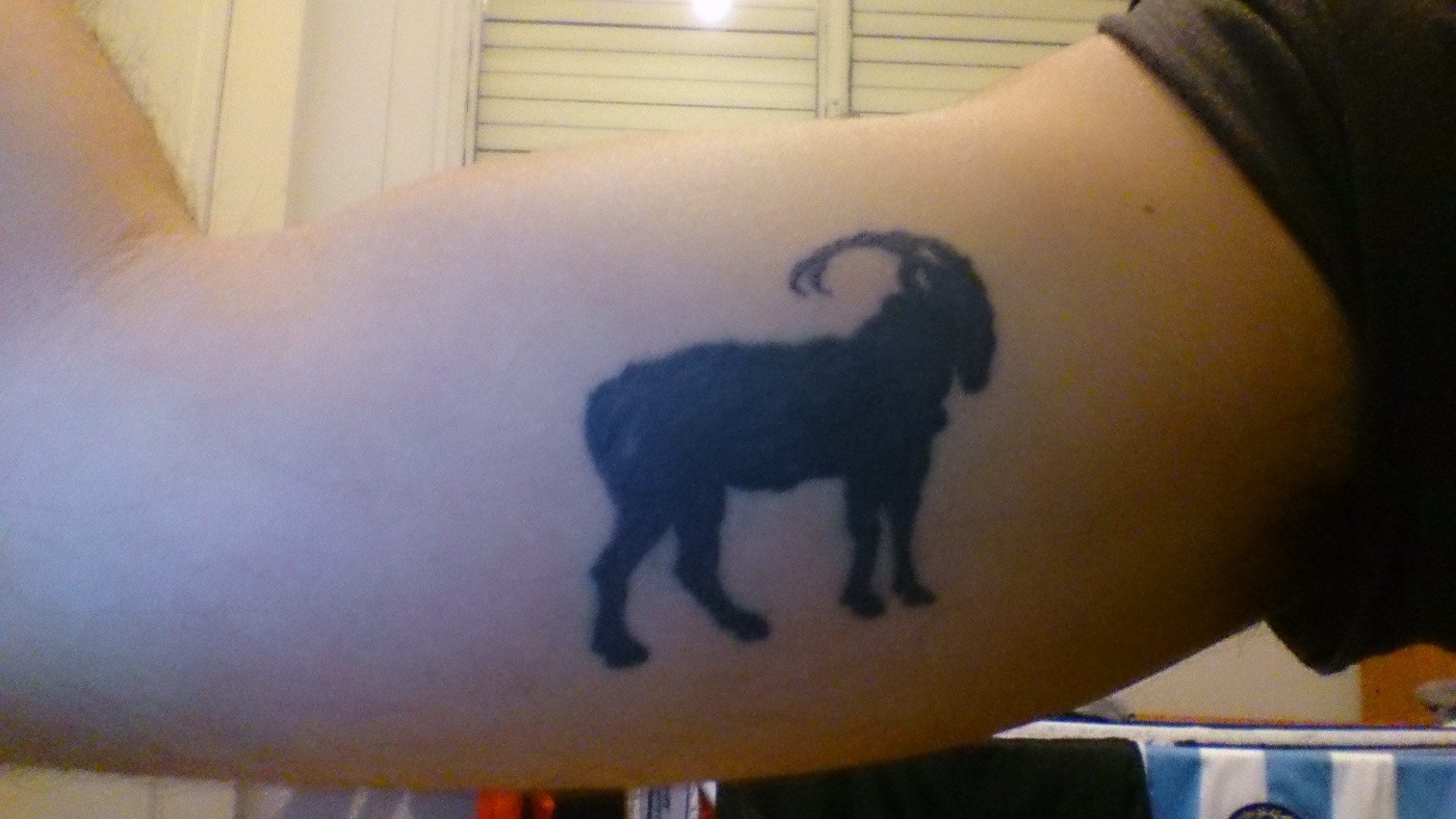 Black Goat Tattoo On Inner Bicep