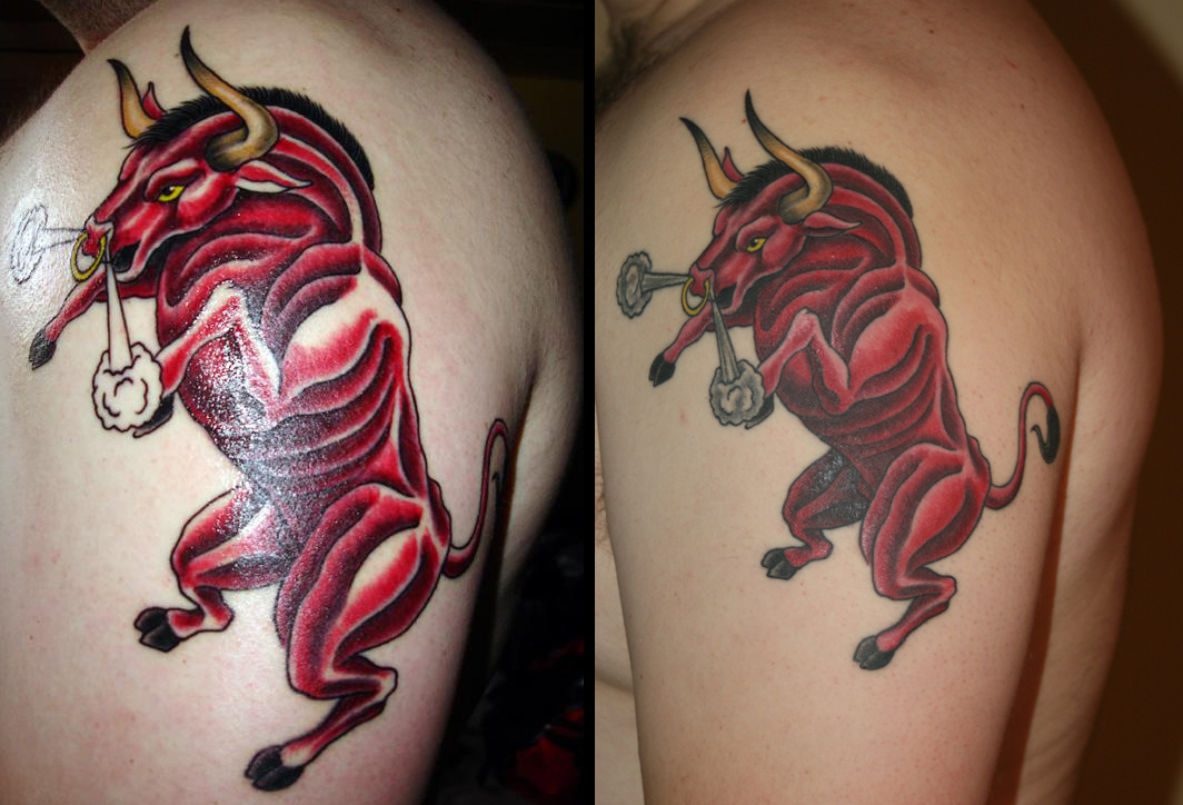 Red Ink Taurus Tattoo On Man Left Shoulder