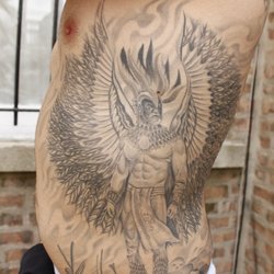 Grey Ink Winged Archer Tattoo On Side Rib