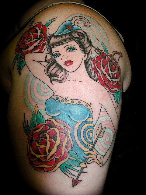 Red Rose Flowers And Archer Tattoo On Half Sleeve