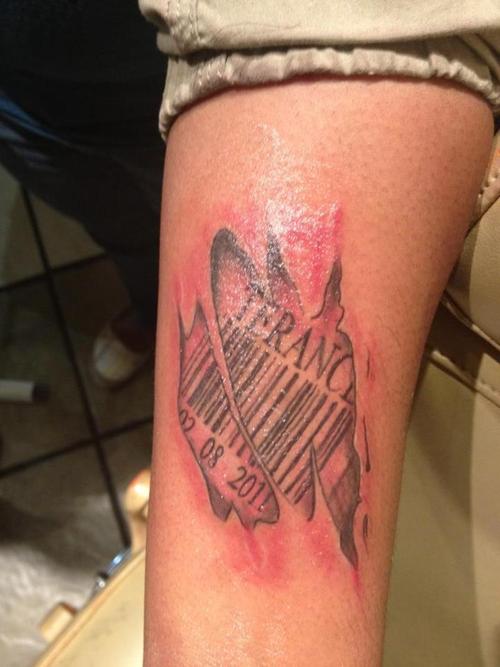 Ripped Skin Barcode Tattoo On Arm