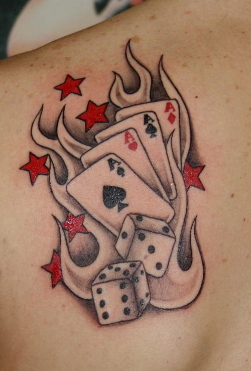 Red Stars And Cards Dice Tattoo On Left Back Shoulder
