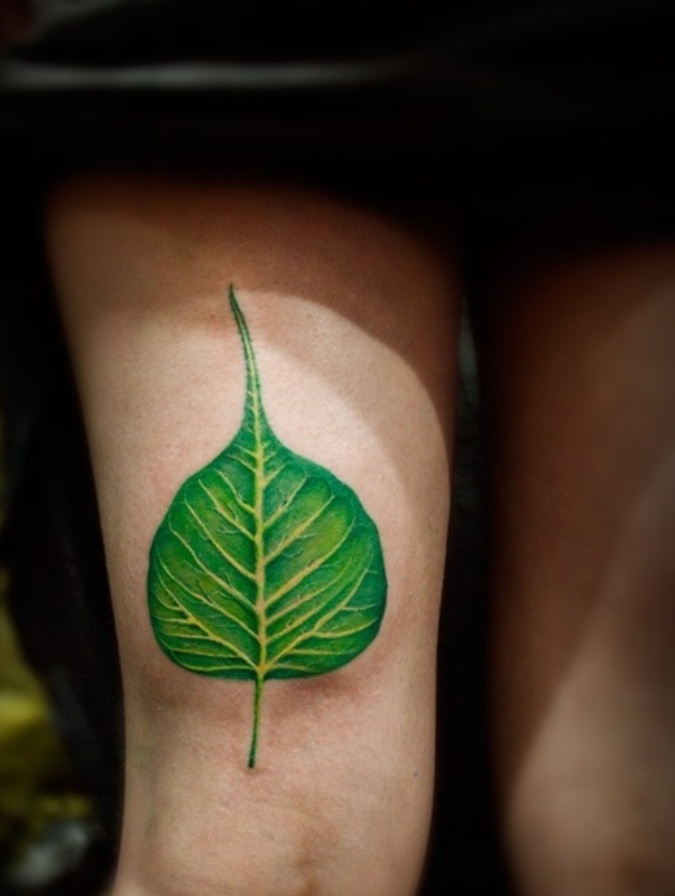 Green Peepal  Leaf Tattoo On Thigh