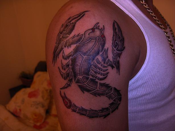 Grey Ink Scorpio Tattoo On Right Shoulder