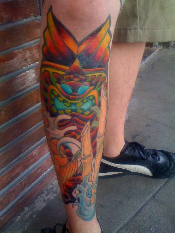 Tiki Tattoo On Right Leg