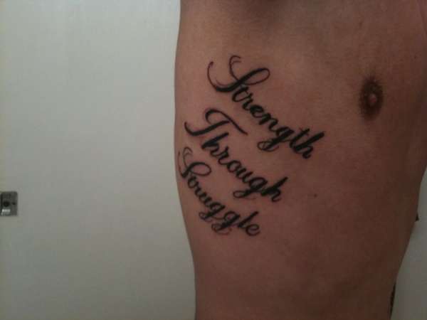 Strength Through Struggle Tattoo On Side Rib