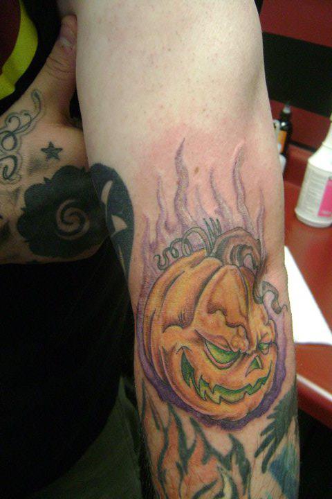 Yellow Pumpkin Tattoo On Sleeve