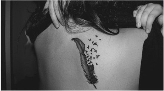 Girl Upperback Birds Flying From Feather Tattoo