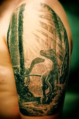 Man Left Half Sleeve Dinosaur Tattoo