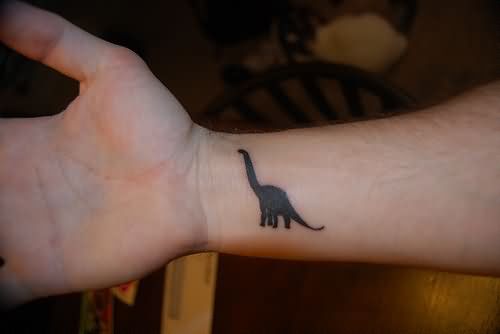 Right Wrist Dinosaur Tattoo
