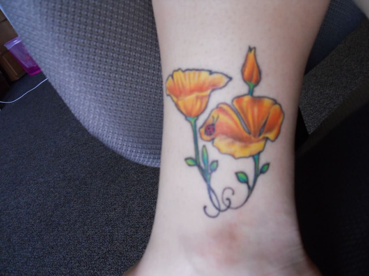 Yellow Poppy Flowers Tattoo