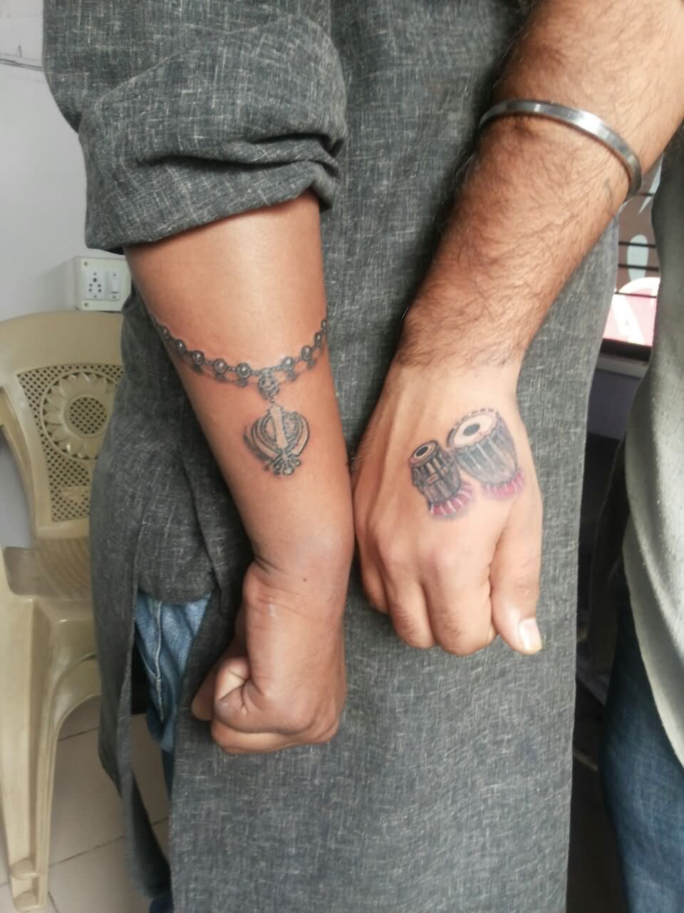 Grey Ink Khanda With Chain and Tabla Tattoos