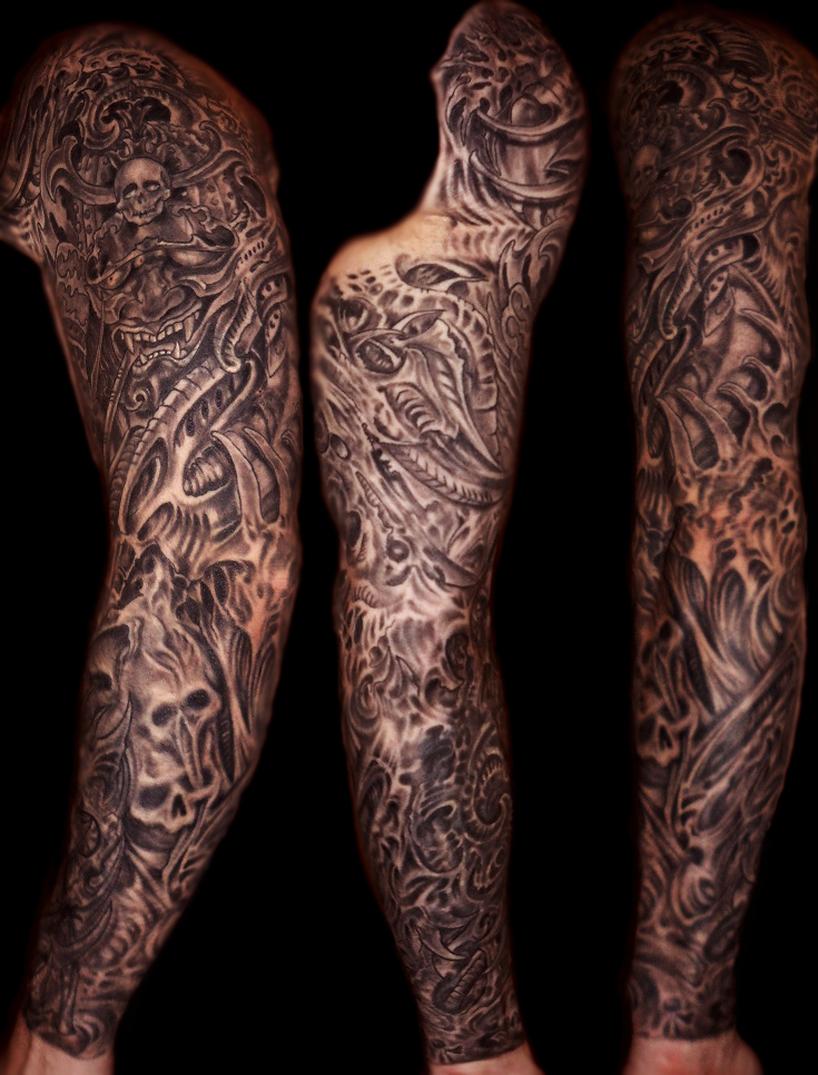 Grey Ink Biomechanical Grime Tattoo On Sleeve