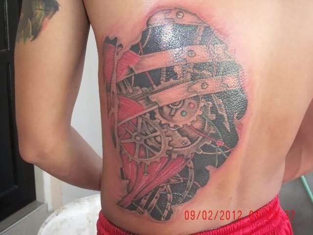 Nice Biomechanical Tattoo On Back