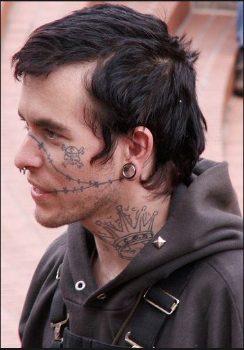 Pirate Skull On Face And Outline Skull Tattoo On Side Neck