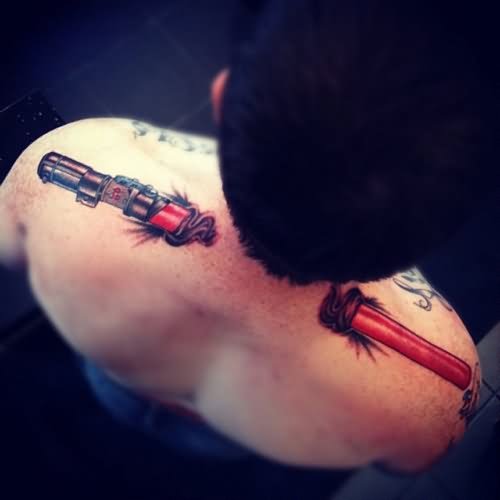 Star Wars Sword Tattoo On Upper Shoulders