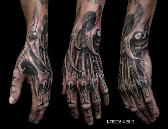 Black Ink Bio Mechanical Hand Tattoo By B. Childs