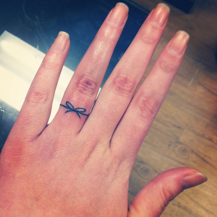 Knot Shaped Ring Tattoo For Girls