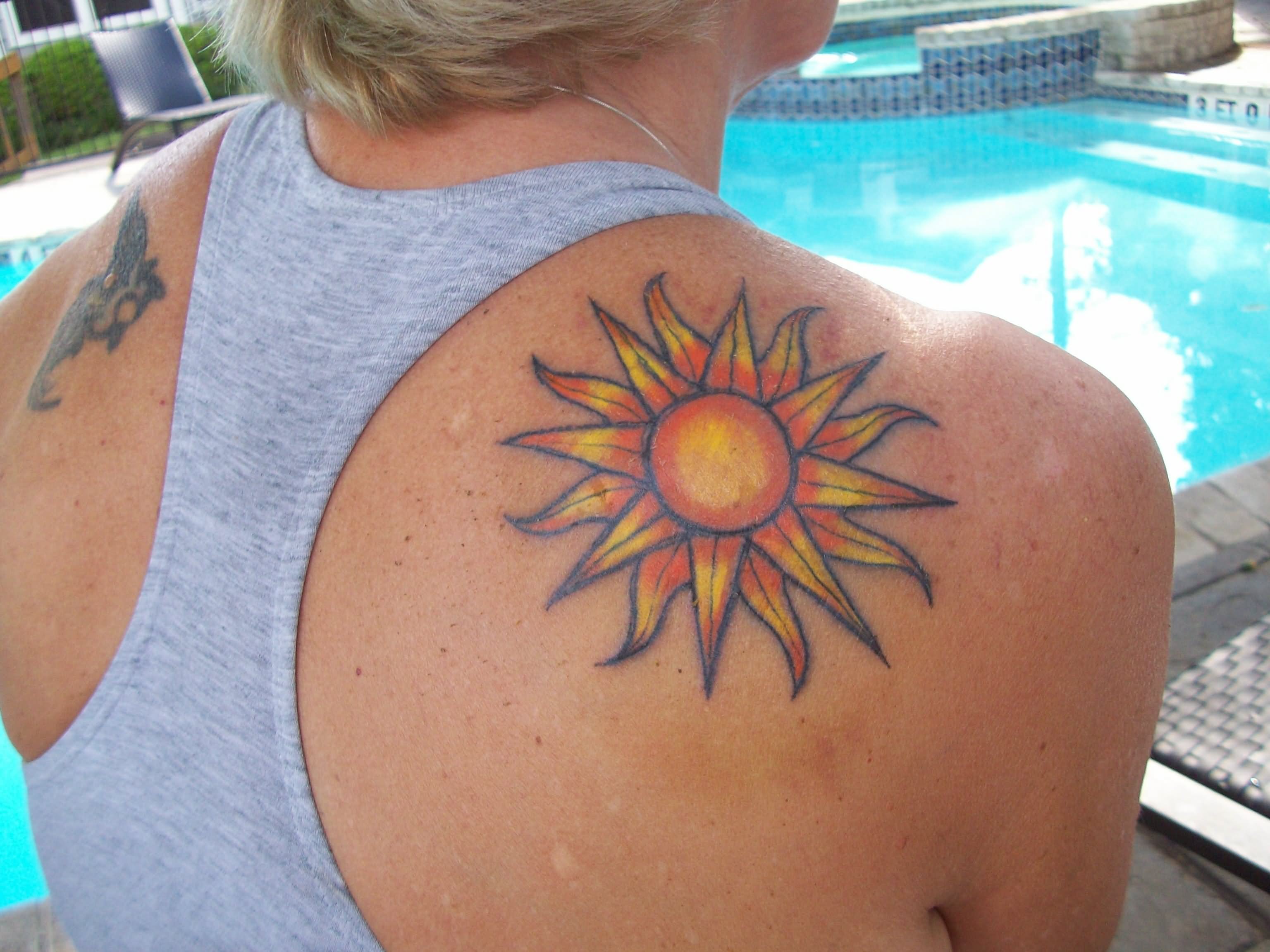 Traditional Sun Tattoo On Shoulder