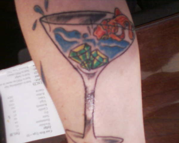 Tiny Fish In Martini Glass Tattoo On Arm