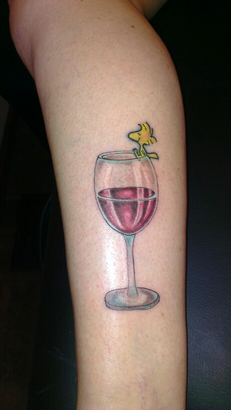 Woodstock Wine Glass Tattoo On Arm