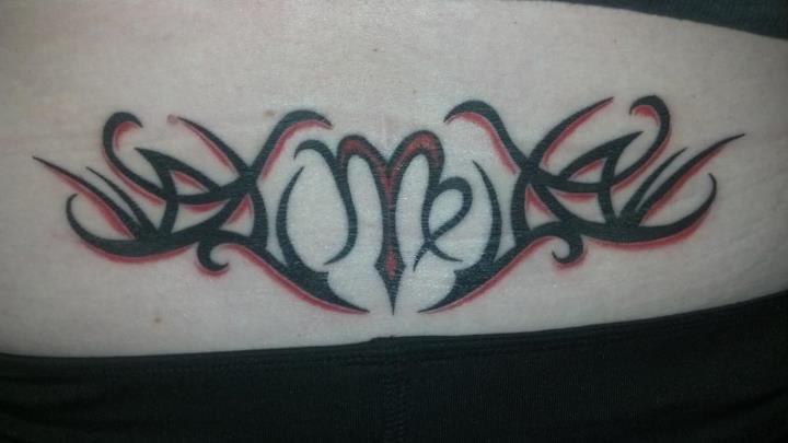 Virgo Sign Lower Back Tribal Tattoo