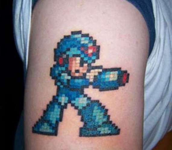 Animated Video Game Tattoo On Bicep
