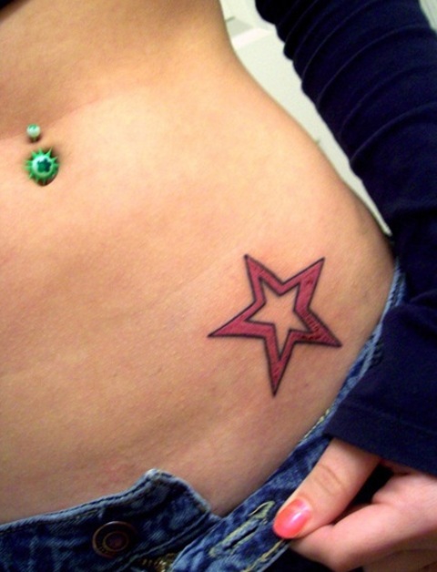 Girl Showing Her Star Waist Tattoo